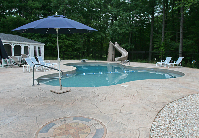 Swimming pool and stamped concrete project example 191